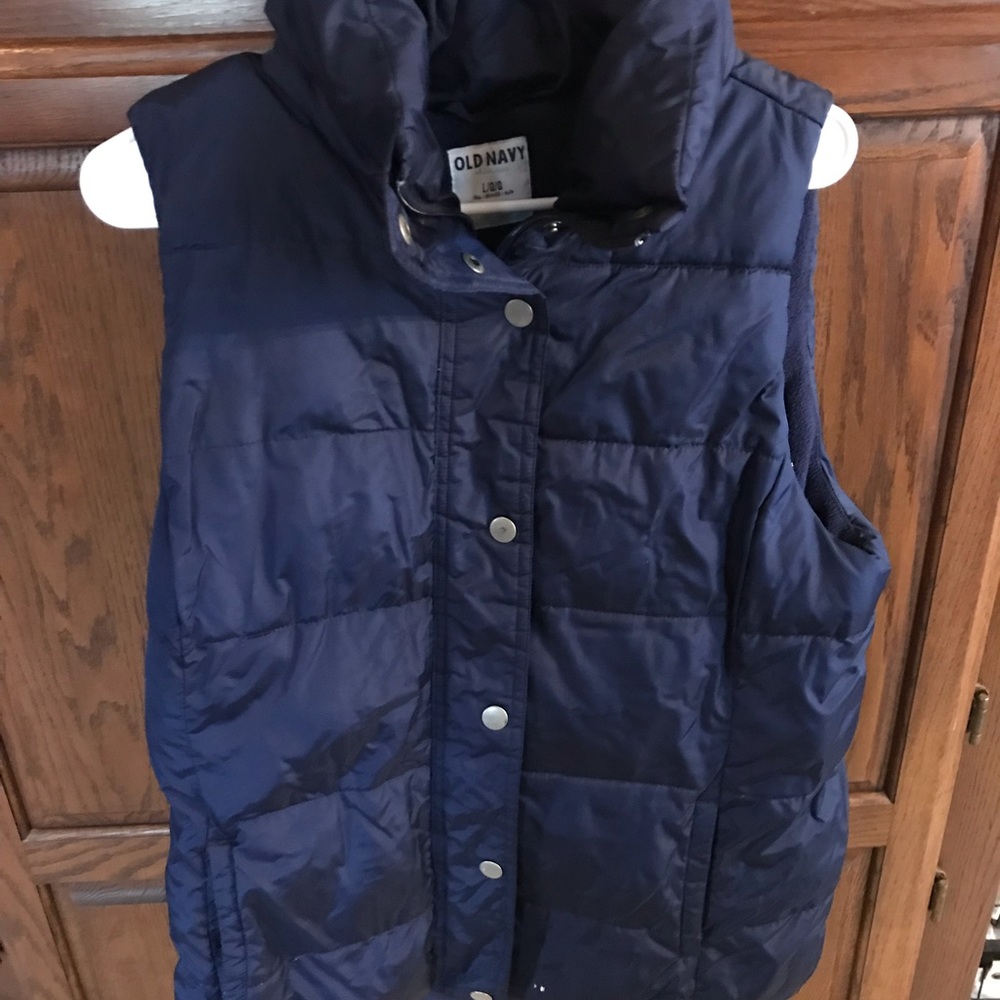 Navy puffer vest with snap buttons